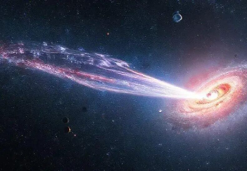 Rare Multi-Tailed Comet 3I/ATLAS Makes Stunning Appearance Next to Galaxy